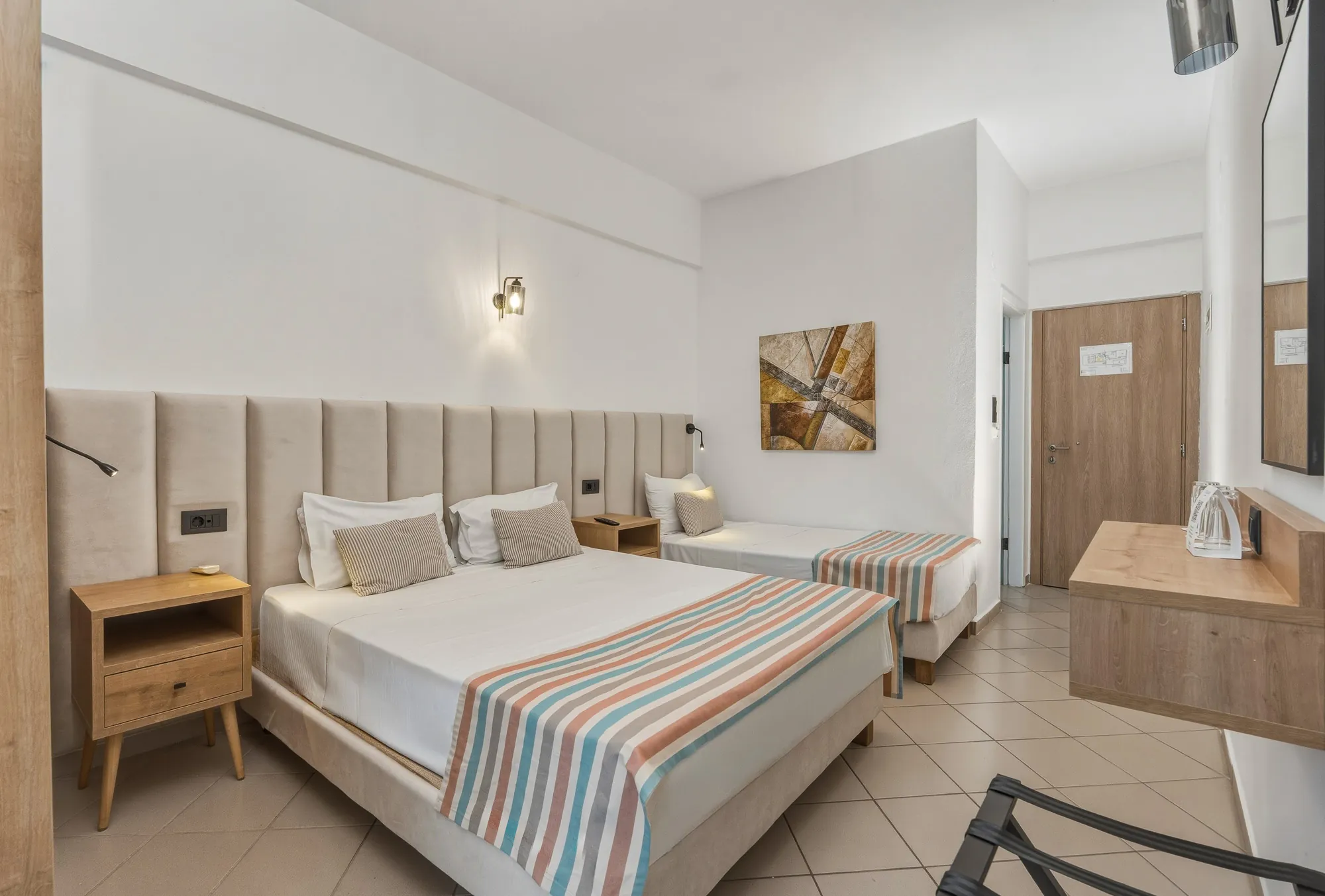 erato-hotel-standard-double-room-2-adults-1-child-02-wide-room-overview-with-extra-bed